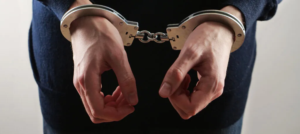 handcuffed man