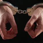 handcuffed man